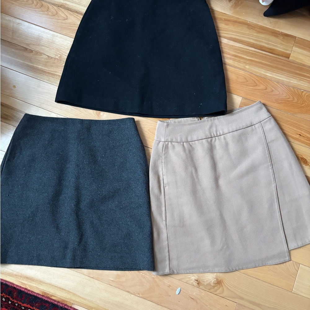 Elegant Women's Skirt Collection - Black, Gray, and Tan